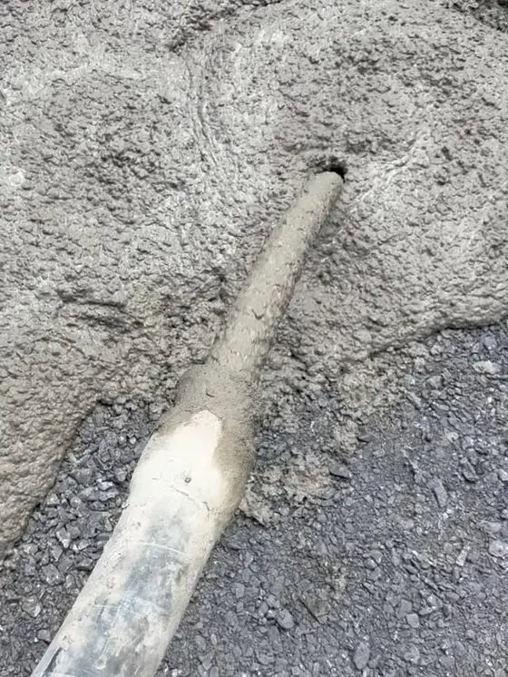 Concrete pumped through a 75 ft hose to a backyard patio in the Philadelphia suburbs
