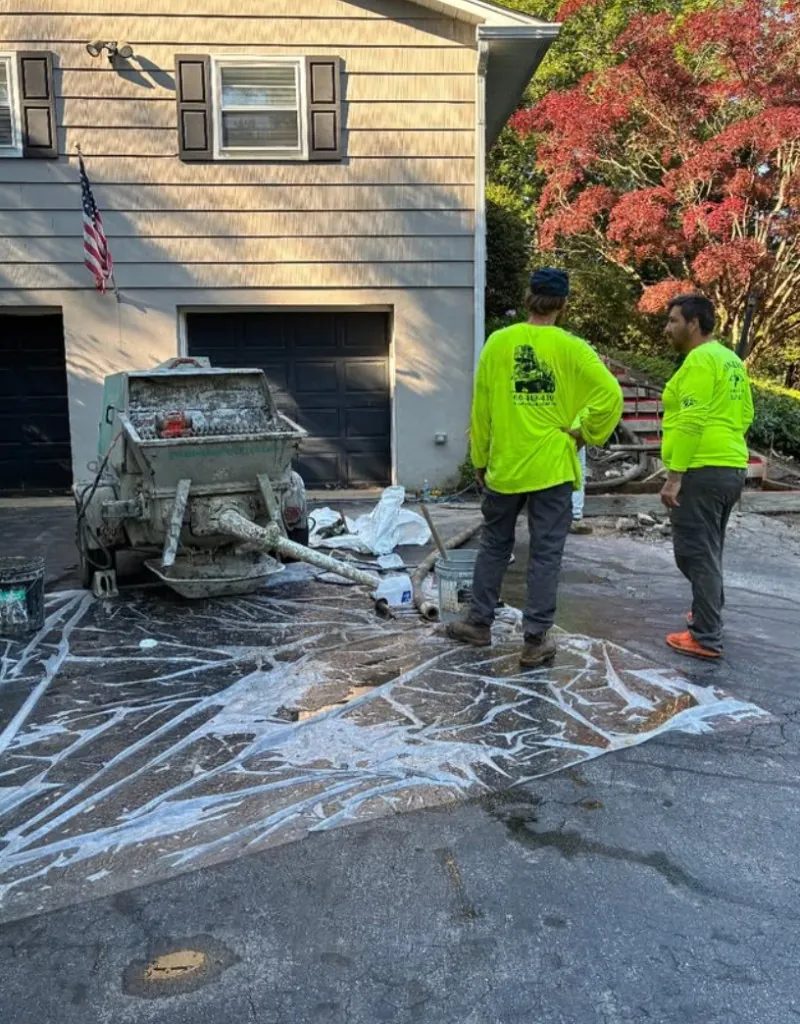 Dougherty Concrete pump line feeding a driveway concrete pour in Upper Darby, PA